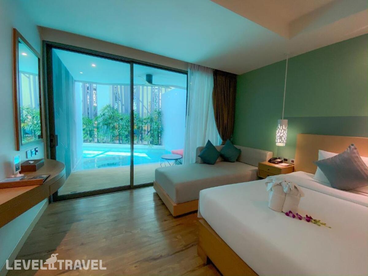 фотографии номера Двухместный номер Pool Access Deluxe двуспальная кровать отеля Crest Resort & Pool Villas в Таиланд(Три Транг Бич) - фото №4