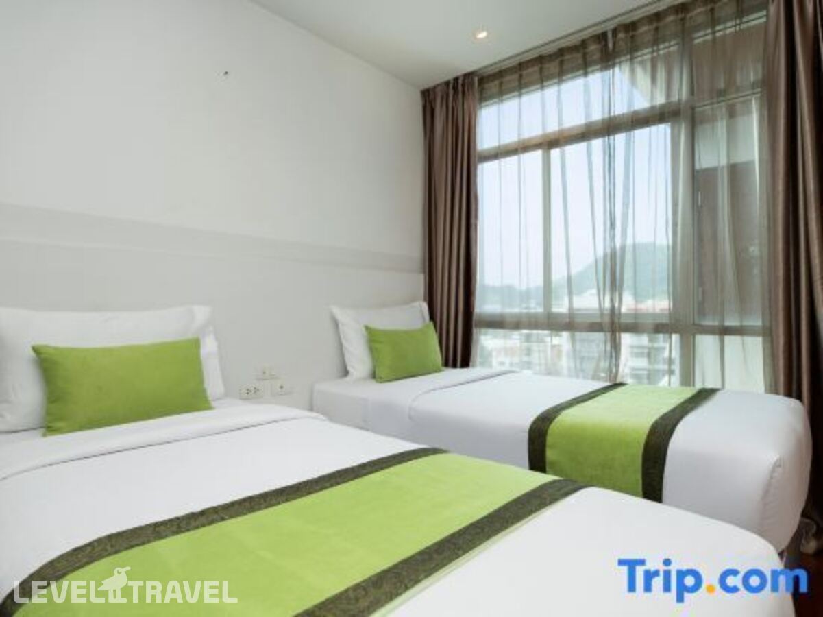 фотографии номера Делюкс (две односпальные кровати) отеля Icheck Inn Residence Patong в Таиланд(Патонг Бич) - фото №2