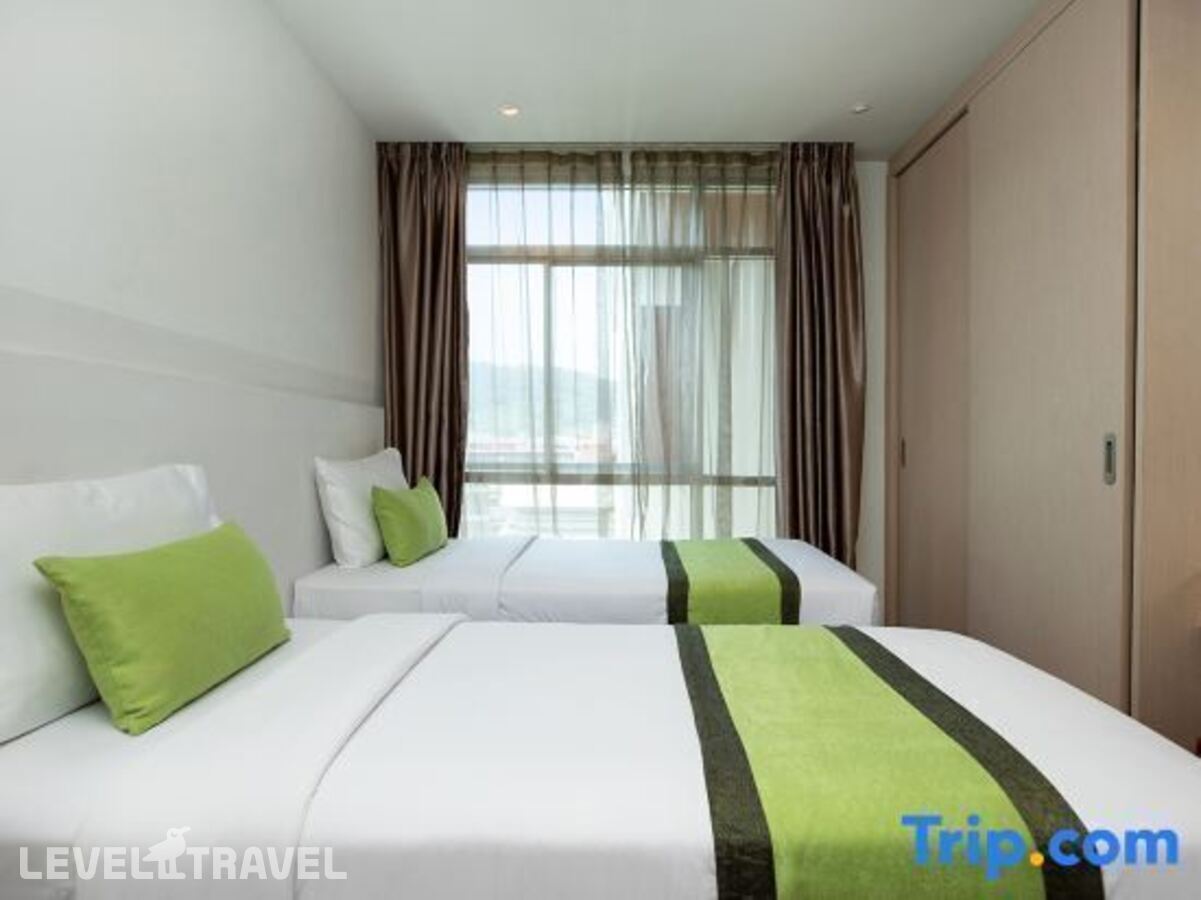 фотографии номера Делюкс (две односпальные кровати) отеля Icheck Inn Residence Patong в Таиланд(Патонг Бич) - фото №3