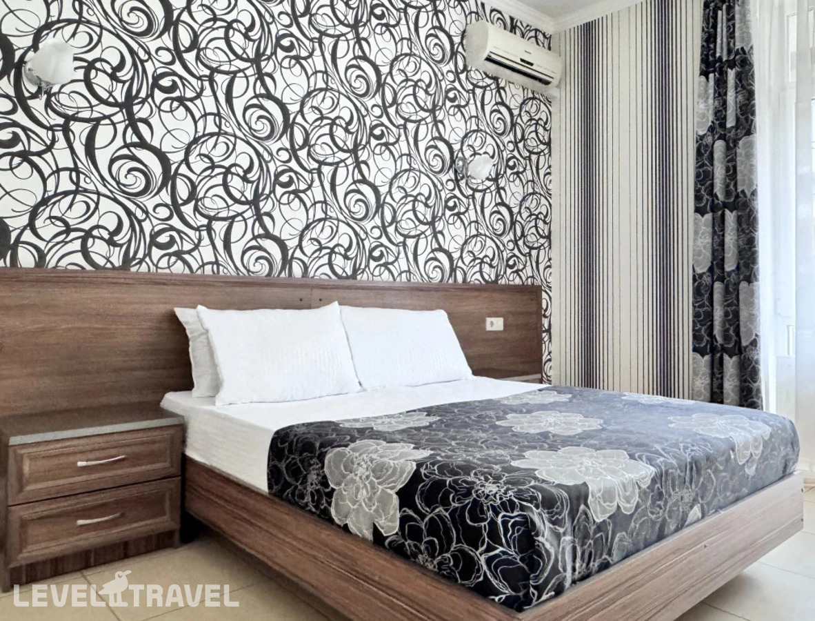 Двухместный номер Comfort Plus с балконом двуспальная кровать — фото 1