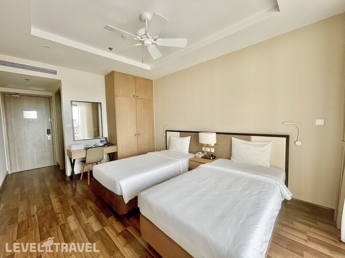 фотографии номера Семейный с видом на бассейн отеля Vinholidays Fiesta Phu Quoc (Ex.Vinholidays 1 Phu Quoc) в Вьетнам(Фукуок) - фото №2