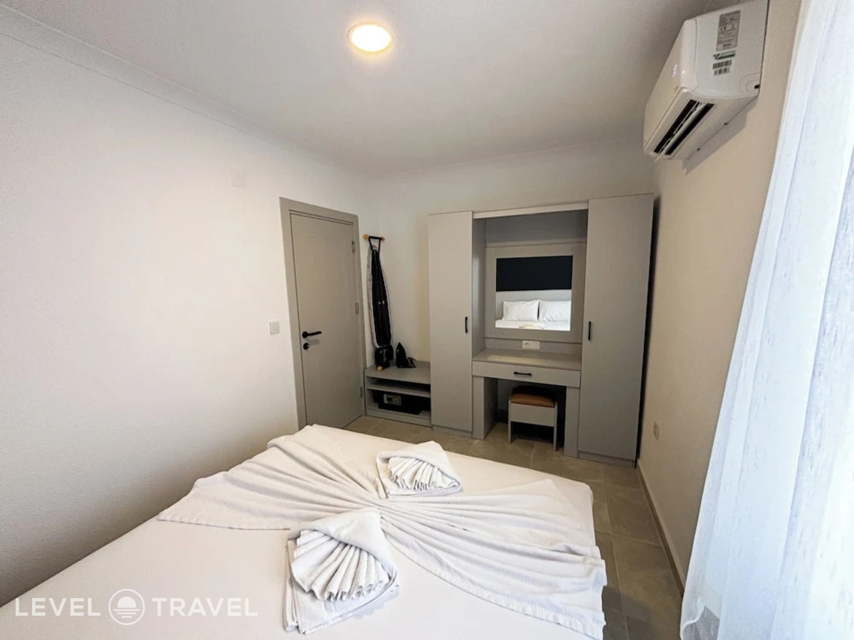 фотографии номера Семейный люкс отеля Green House Apart Hotel в Турция(Гюмбет) - фото №2