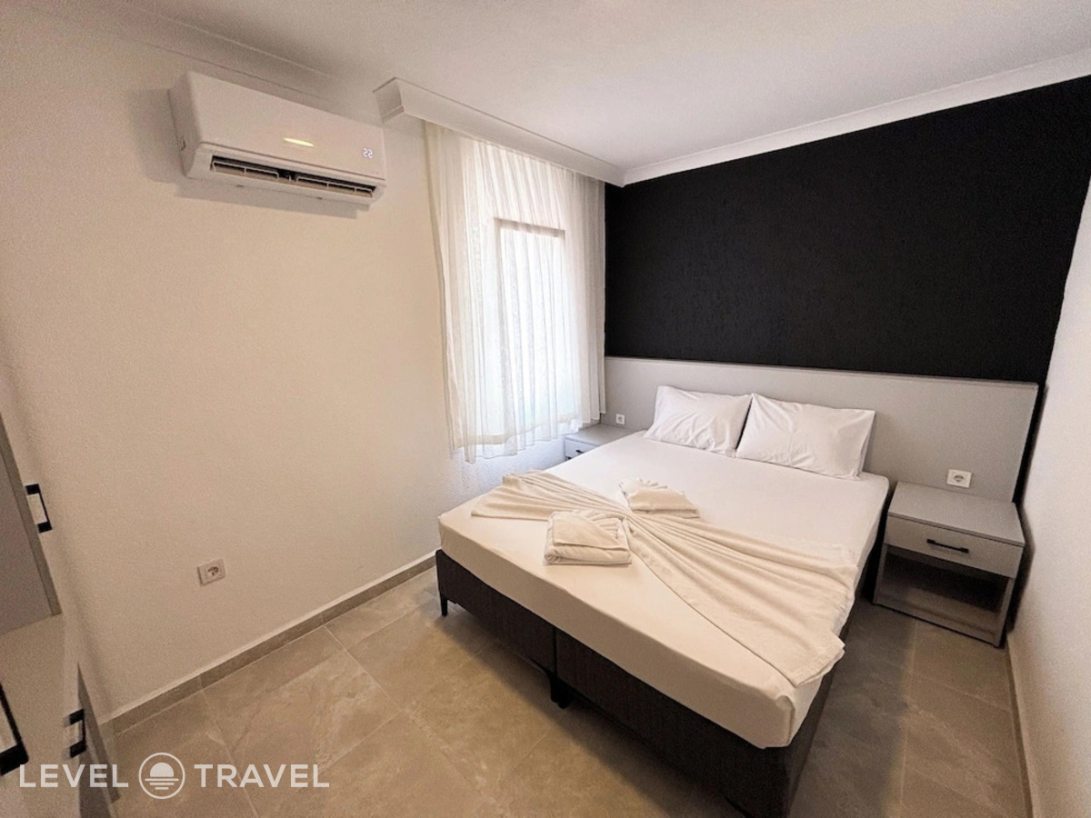 фотографии номера Семейный люкс отеля Green House Apart Hotel в Турция(Гюмбет) - фото №1