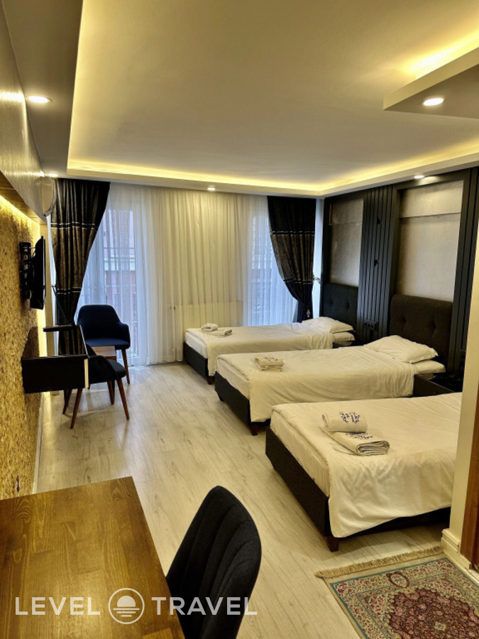 фотографии номера Трёхместный номер с террасой отеля Sirkeci Quietness Hotel в Турция(Фатих) - фото №2