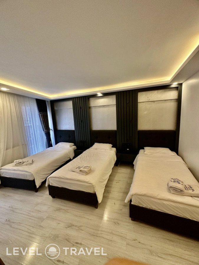 фотографии номера Трёхместный номер с террасой отеля Sirkeci Quietness Hotel в Турция(Фатих) - фото №4
