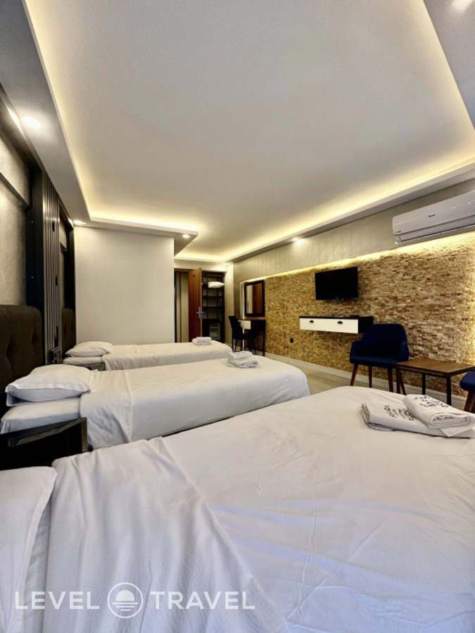 фотографии номера Трёхместный номер с террасой отеля Sirkeci Quietness Hotel в Турция(Фатих) - фото №1