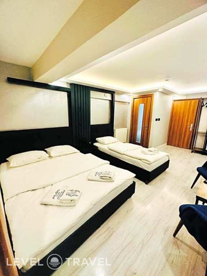 фотографии номера Номер семейный Улучшенный отеля Sirkeci Quietness Hotel в Турция(Фатих) - фото №2