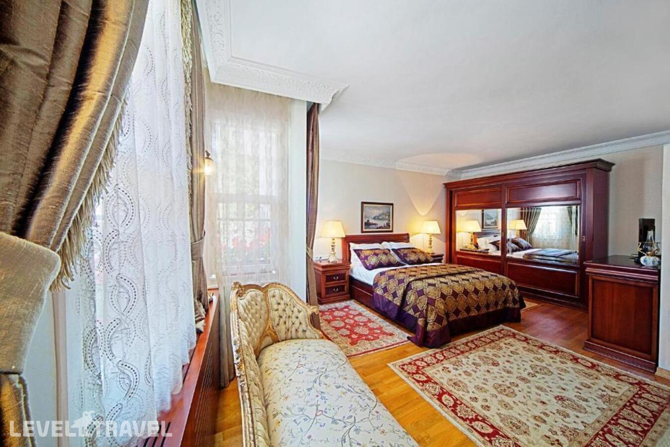 Двухместный полулюкс Deluxe двуспальная кровать — фото 1