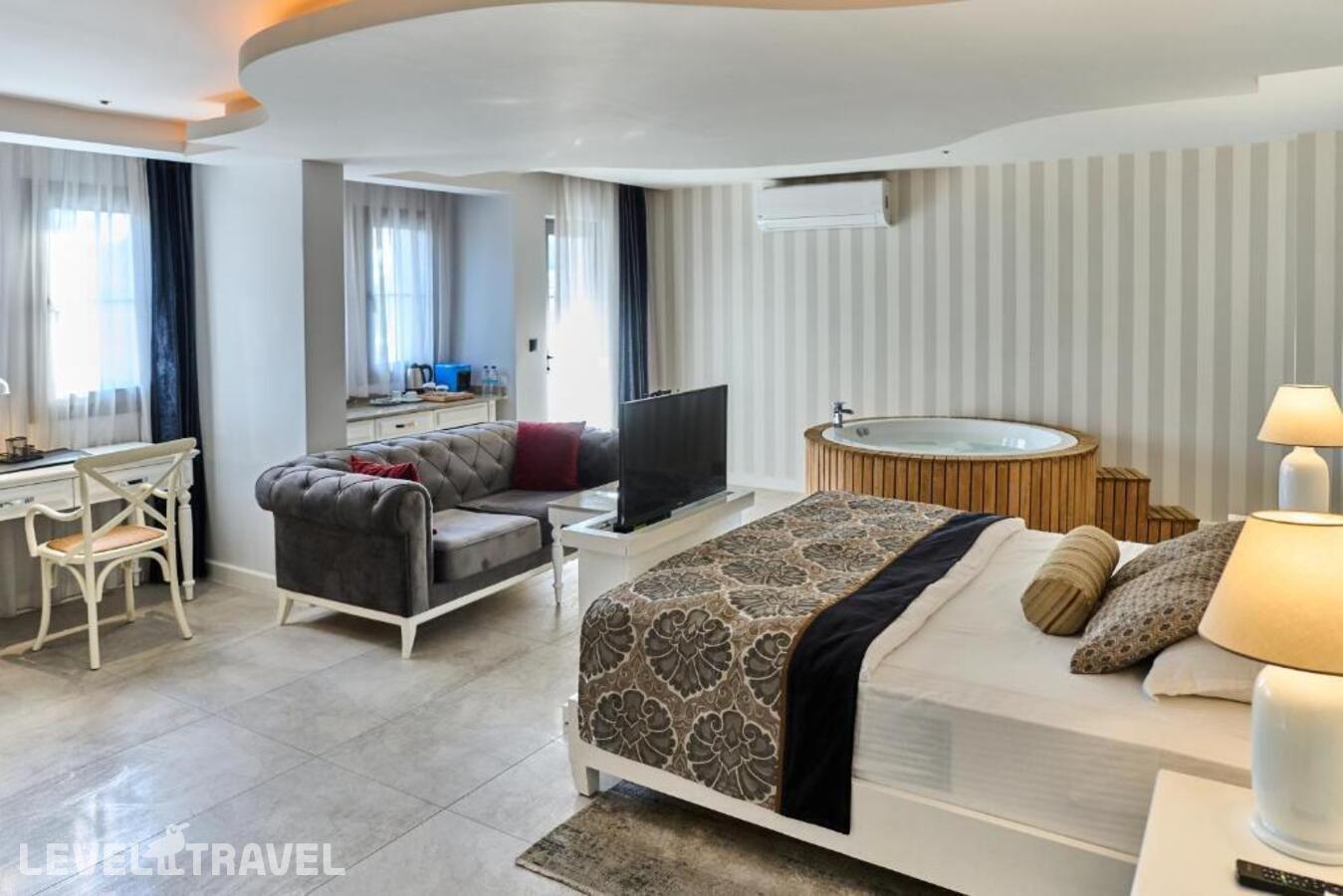фотографии номера Делюкс отеля Salonika Suites в Турция(Олюдениз) - фото №2