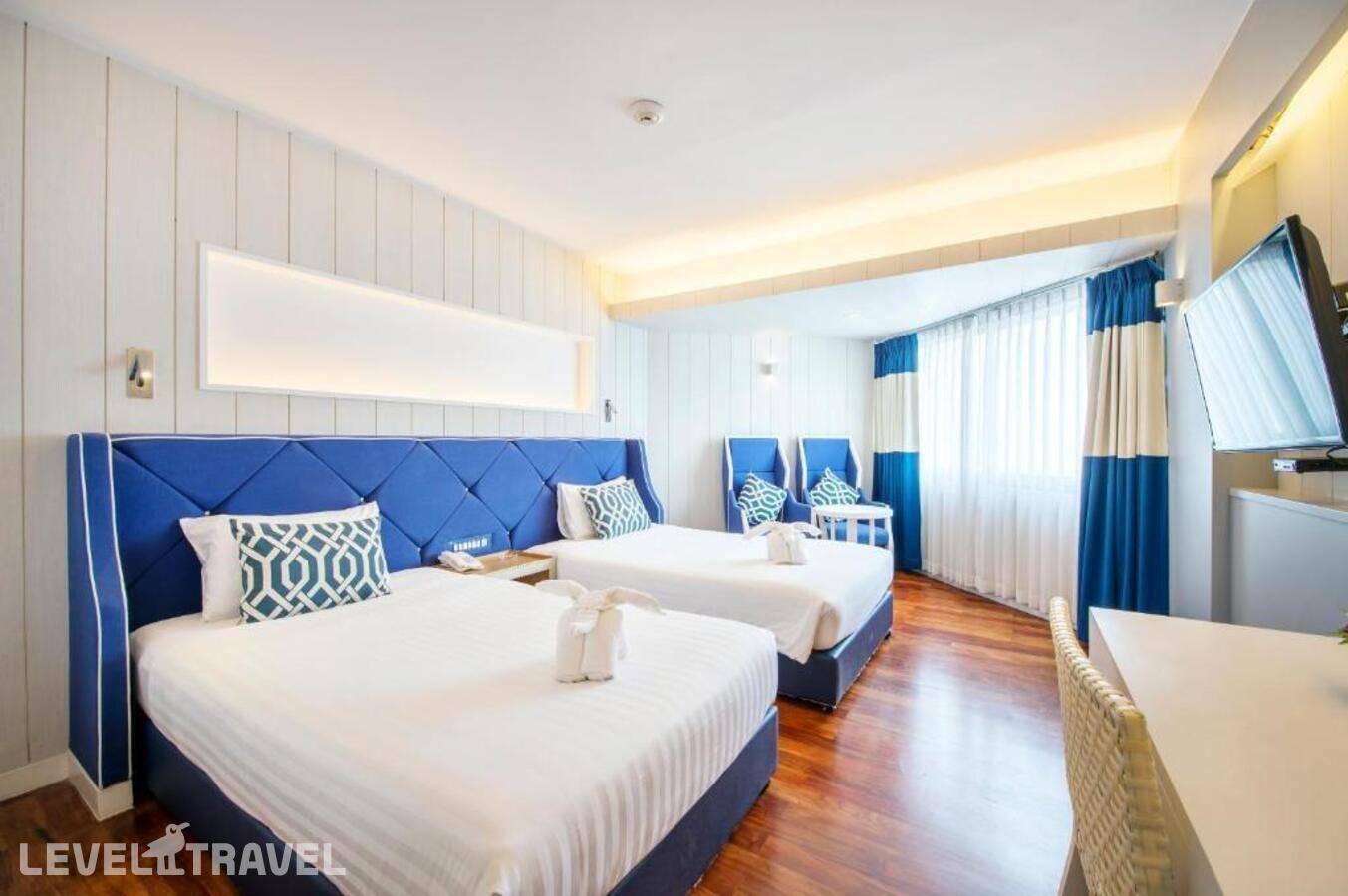 фотографии номера Улучшенный с видом на море (главное здание) отеля Jomtien Palm Beach Hotel в Таиланд(Джомтьен) - фото №1