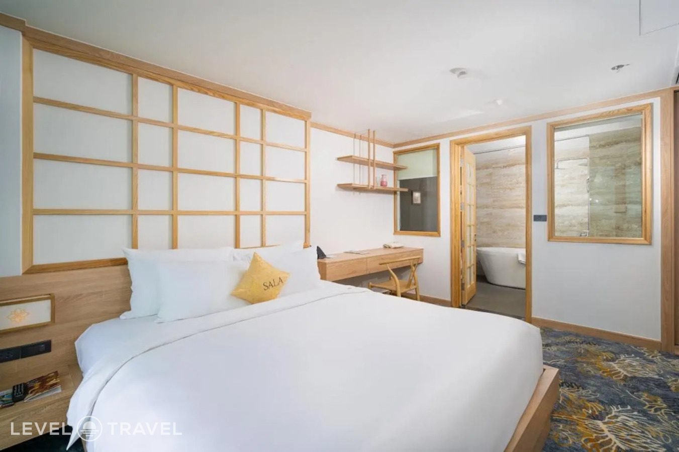 фотографии номера Двухместные апартаменты Osaka двуспальная кровать отеля Sala Danang Beach в Вьетнам(Дананг) - фото №1