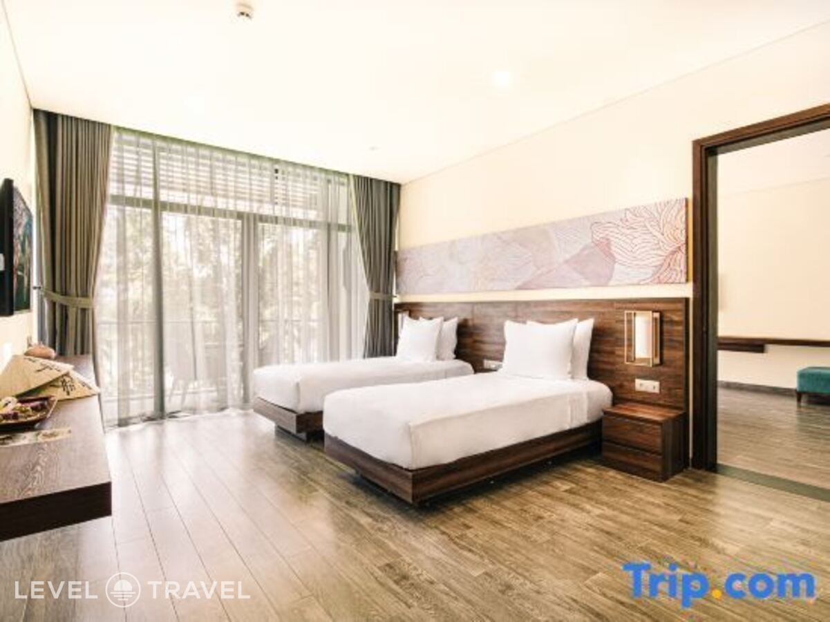 фотографии номера Делюкс с видом на реку (две односпальные кровати) отеля Hoi An Memories Resort & Spa в Вьетнам(Хойан) - фото №6