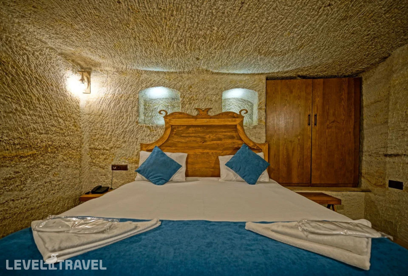 фотографии номера Двухместный номер Cave Standard двуспальная кровать отеля Cappa Cave Hotel в Турция(Гёреме) - фото №4