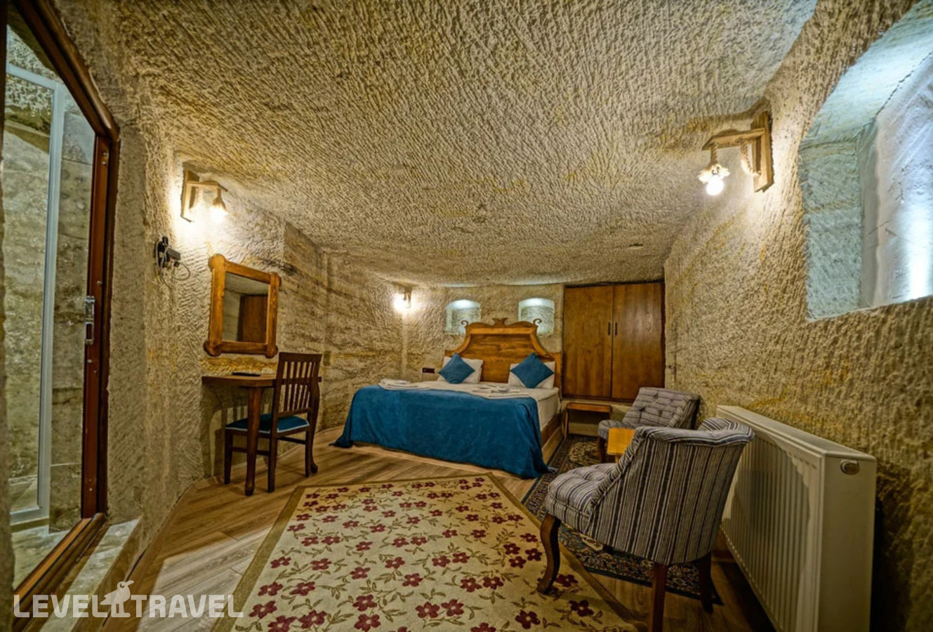 фотографии номера Двухместный номер Cave Standard двуспальная кровать отеля Cappa Cave Hotel в Турция(Гёреме) - фото №2