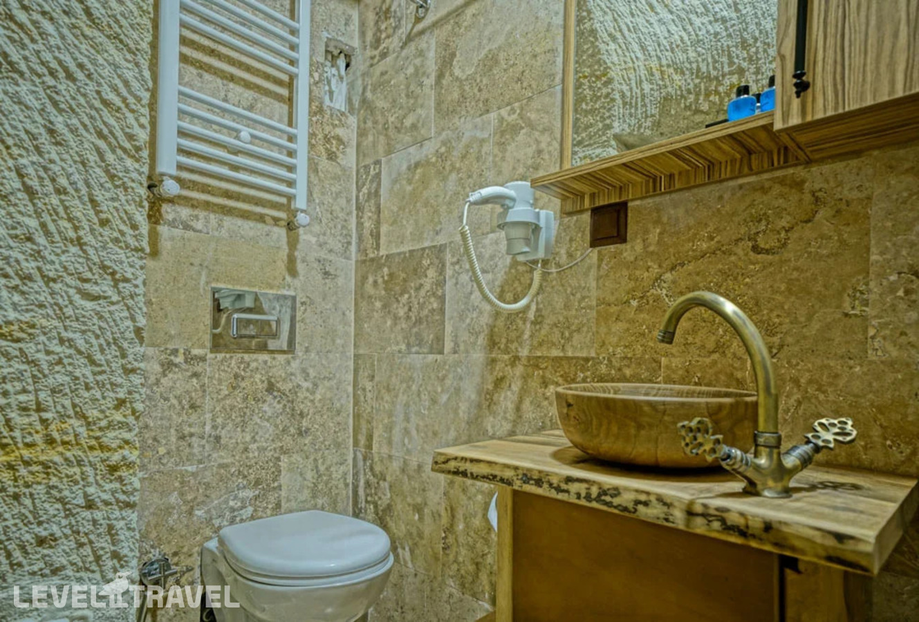 фотографии номера Двухместный номер Cave Standard двуспальная кровать отеля Cappa Cave Hotel в Турция(Гёреме) - фото №8