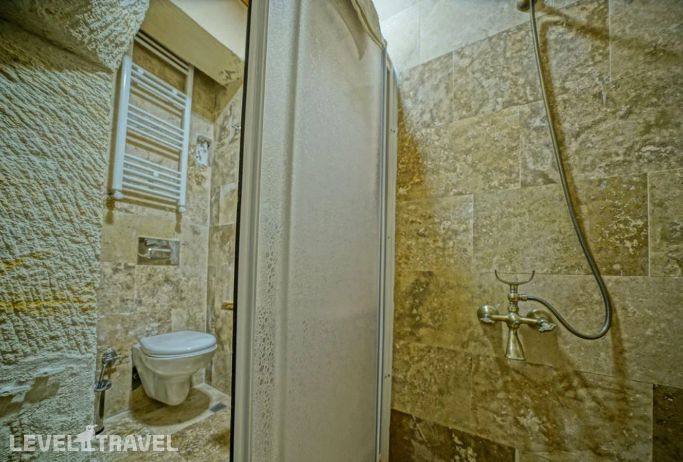 фотографии номера Двухместный номер Cave Standard двуспальная кровать отеля Cappa Cave Hotel в Турция(Гёреме) - фото №9