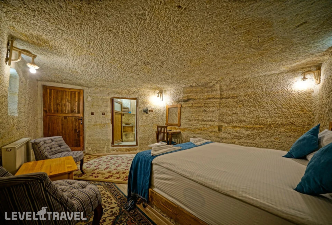фотографии номера Двухместный номер Cave Standard двуспальная кровать отеля Cappa Cave Hotel в Турция(Гёреме) - фото №6