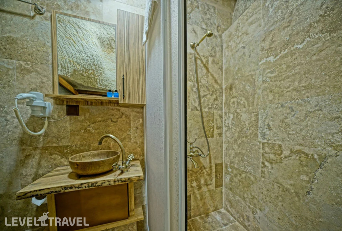 фотографии номера Двухместный номер Cave Standard двуспальная кровать отеля Cappa Cave Hotel в Турция(Гёреме) - фото №7
