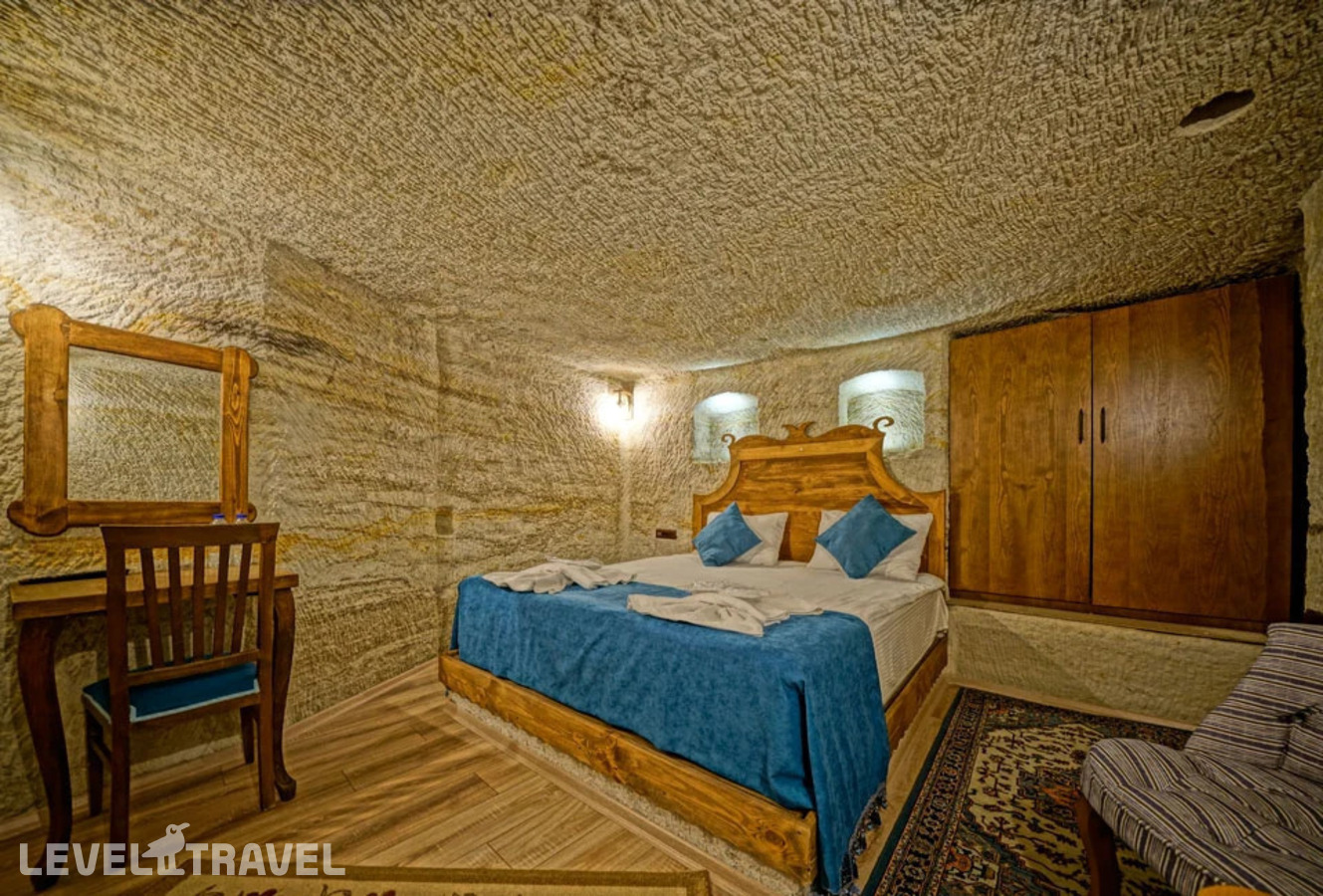 фотографии номера Двухместный номер Cave Standard двуспальная кровать отеля Cappa Cave Hotel в Турция(Гёреме) - фото №1
