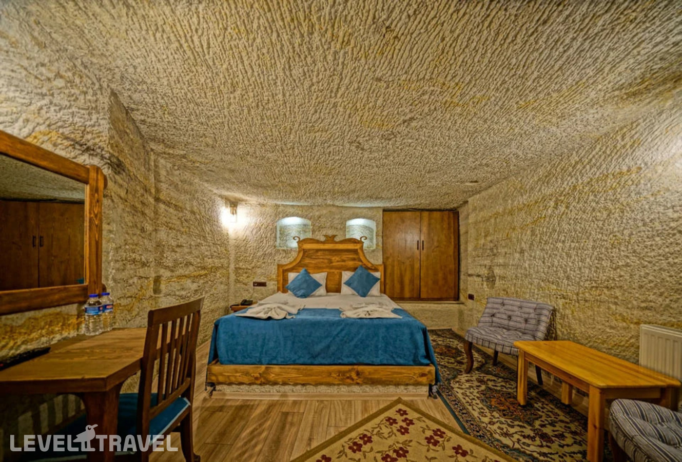 фотографии номера Двухместный номер Cave Standard двуспальная кровать отеля Cappa Cave Hotel в Турция(Гёреме) - фото №3