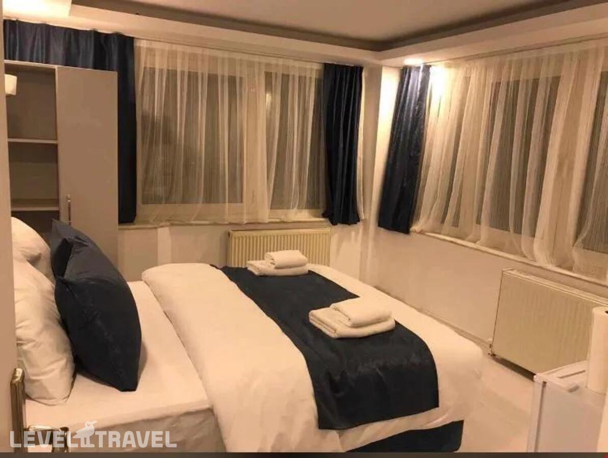 фотографии номера Стандартный номер отеля Asia Lees Inn Hotel в Турция(Бейкоз) - фото №2