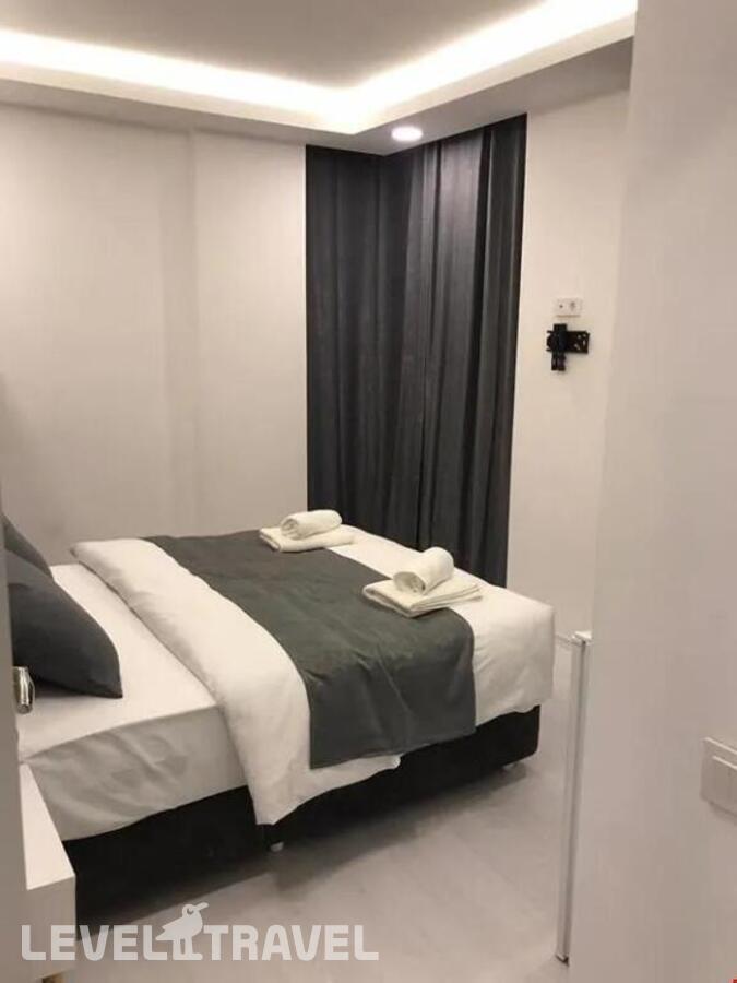 фотографии номера Стандартный номер отеля Asia Lees Inn Hotel в Турция(Бейкоз) - фото №3