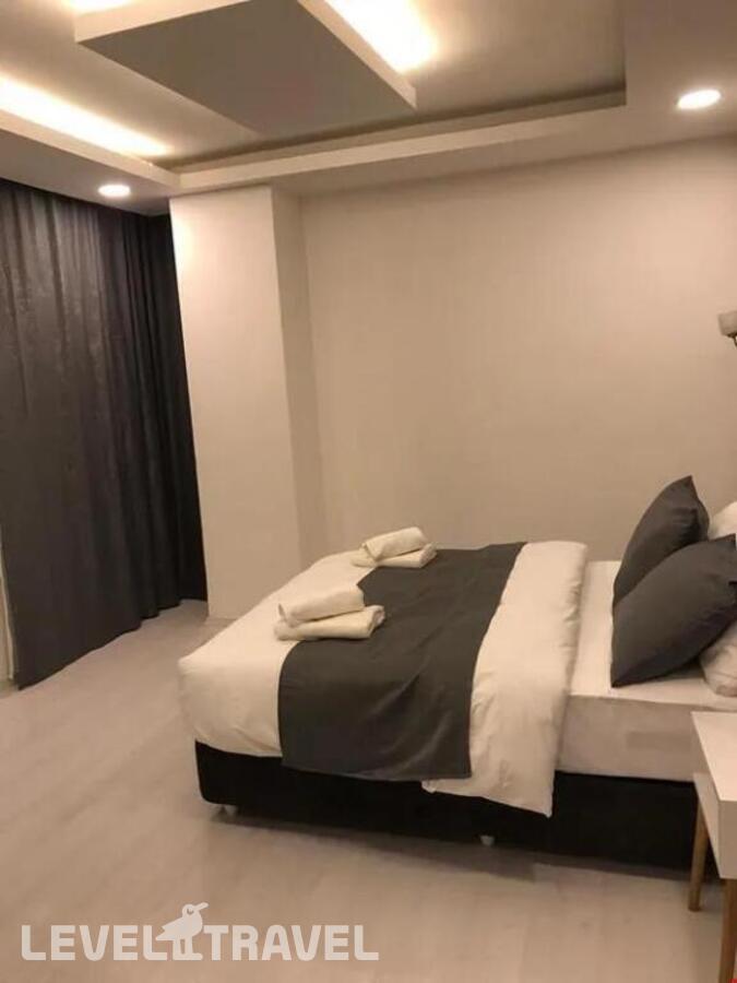 фотографии номера Стандартный номер отеля Asia Lees Inn Hotel в Турция(Бейкоз) - фото №4