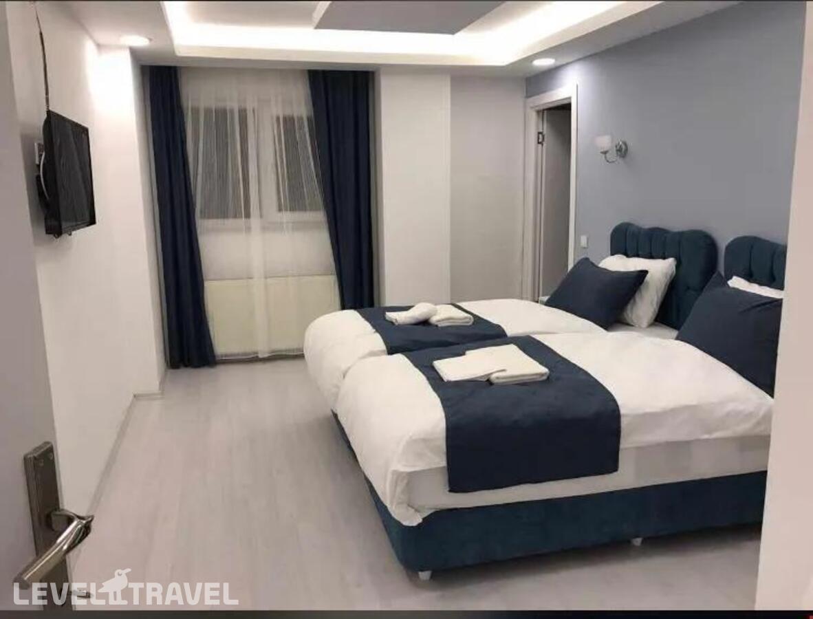 фотографии номера Стандартный номер отеля Asia Lees Inn Hotel в Турция(Бейкоз) - фото №5
