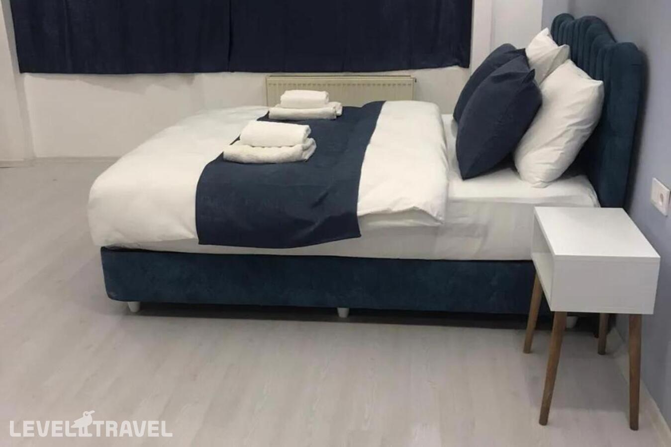 фотографии номера Делюкс отеля Asia Lees Inn Hotel в Турция(Бейкоз) - фото №1