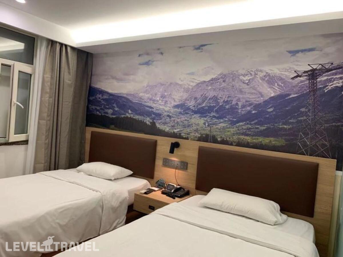 фотографии номера Двухместный номер без окна 2 отдельные кровати отеля Greentree Inn Beijing Chaoyang Shilihe Antique Cit в Китай(Пекин) - фото №1