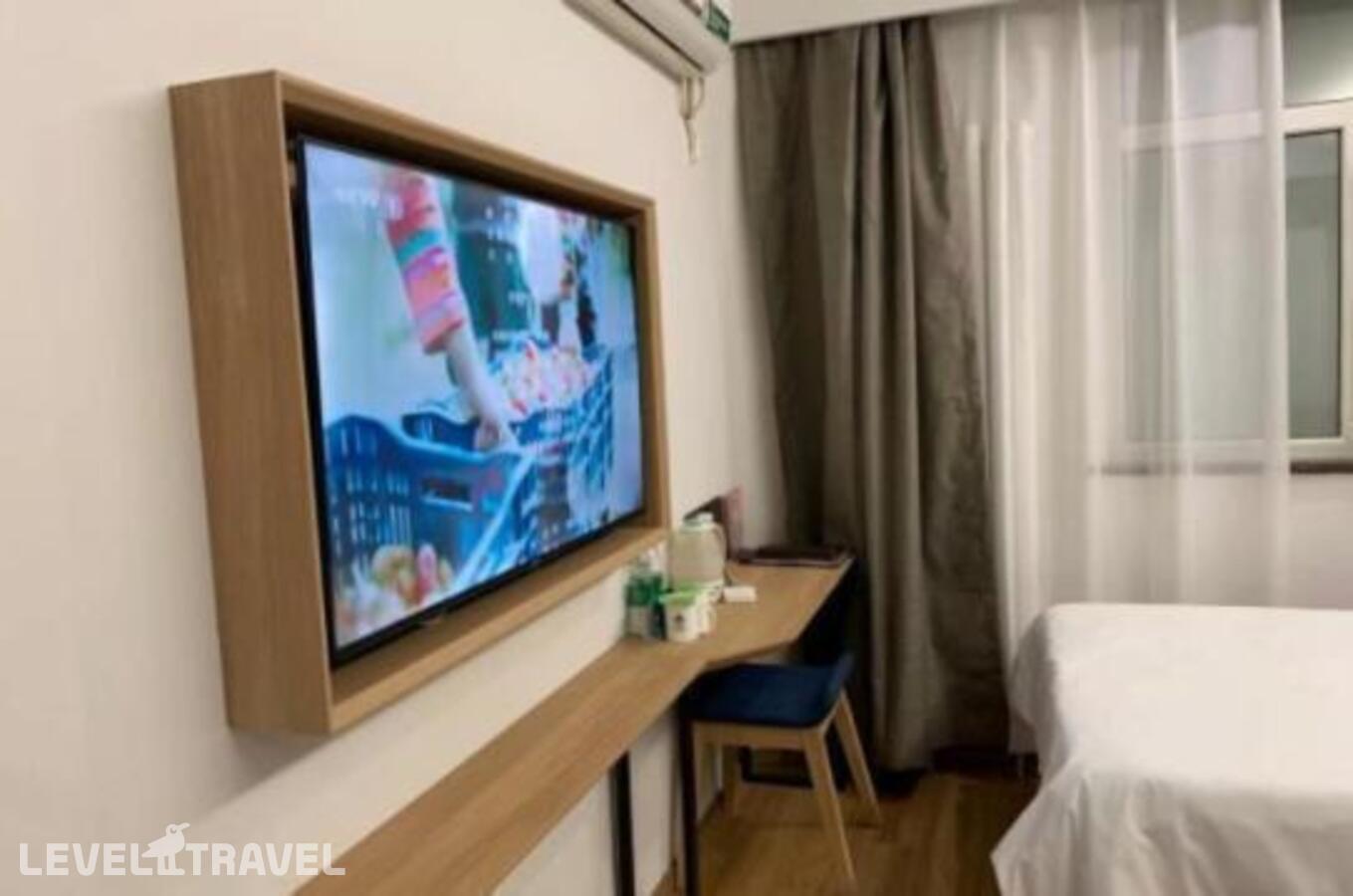 фотографии номера Двухместный номер без окна 2 отдельные кровати отеля Greentree Inn Beijing Chaoyang Shilihe Antique Cit в Китай(Пекин) - фото №3