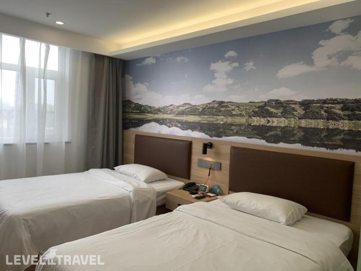 фотографии номера Двухместный номер без окна 2 отдельные кровати отеля Greentree Inn Beijing Chaoyang Shilihe Antique Cit в Китай(Пекин) - фото №2