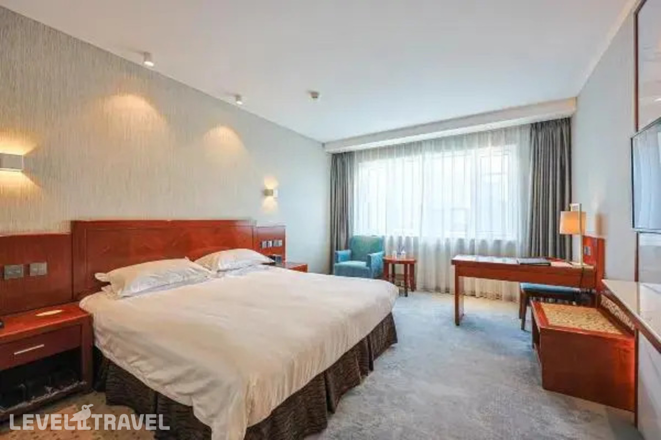 фотографии номера Двухместный номер Deluxe Business двуспальная кровать отеля Ya’Ao International Hotel в Китай(Пекин) - фото №1
