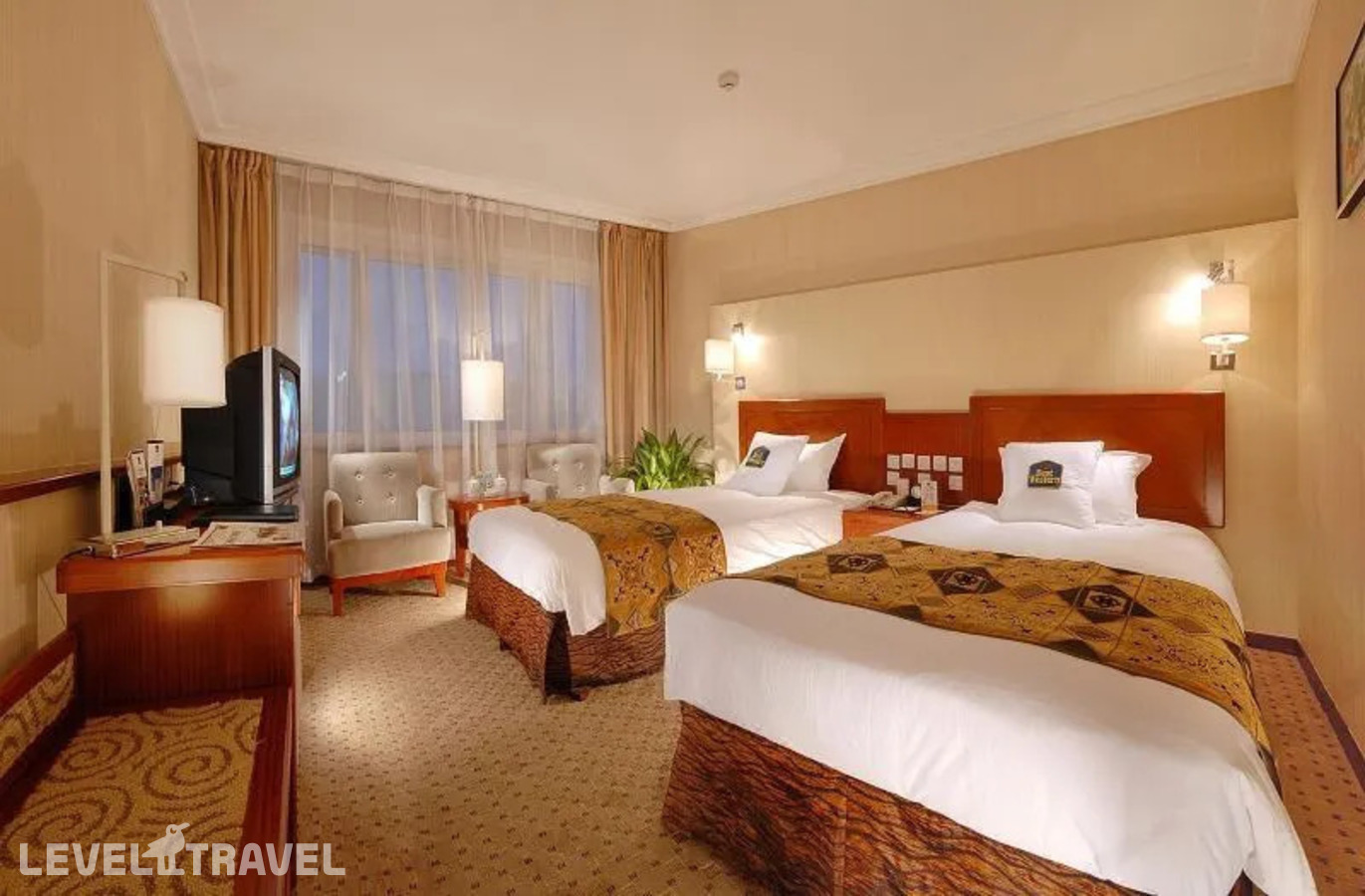фотографии номера Двухместный номер Deluxe Business 2 отдельные кровати отеля Ya’Ao International Hotel в Китай(Пекин) - фото №1