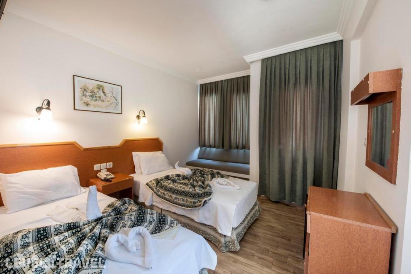 фотографии номера Стандартный номер отеля Belcehan Beach Hotel в Турция(Олюдениз) - фото №3