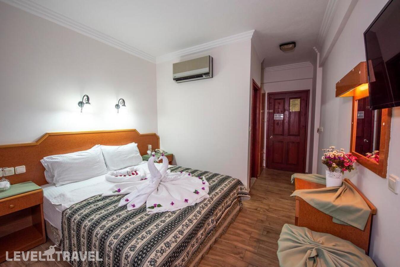 фотографии номера Стандартный номер отеля Belcehan Beach Hotel в Турция(Олюдениз) - фото №1