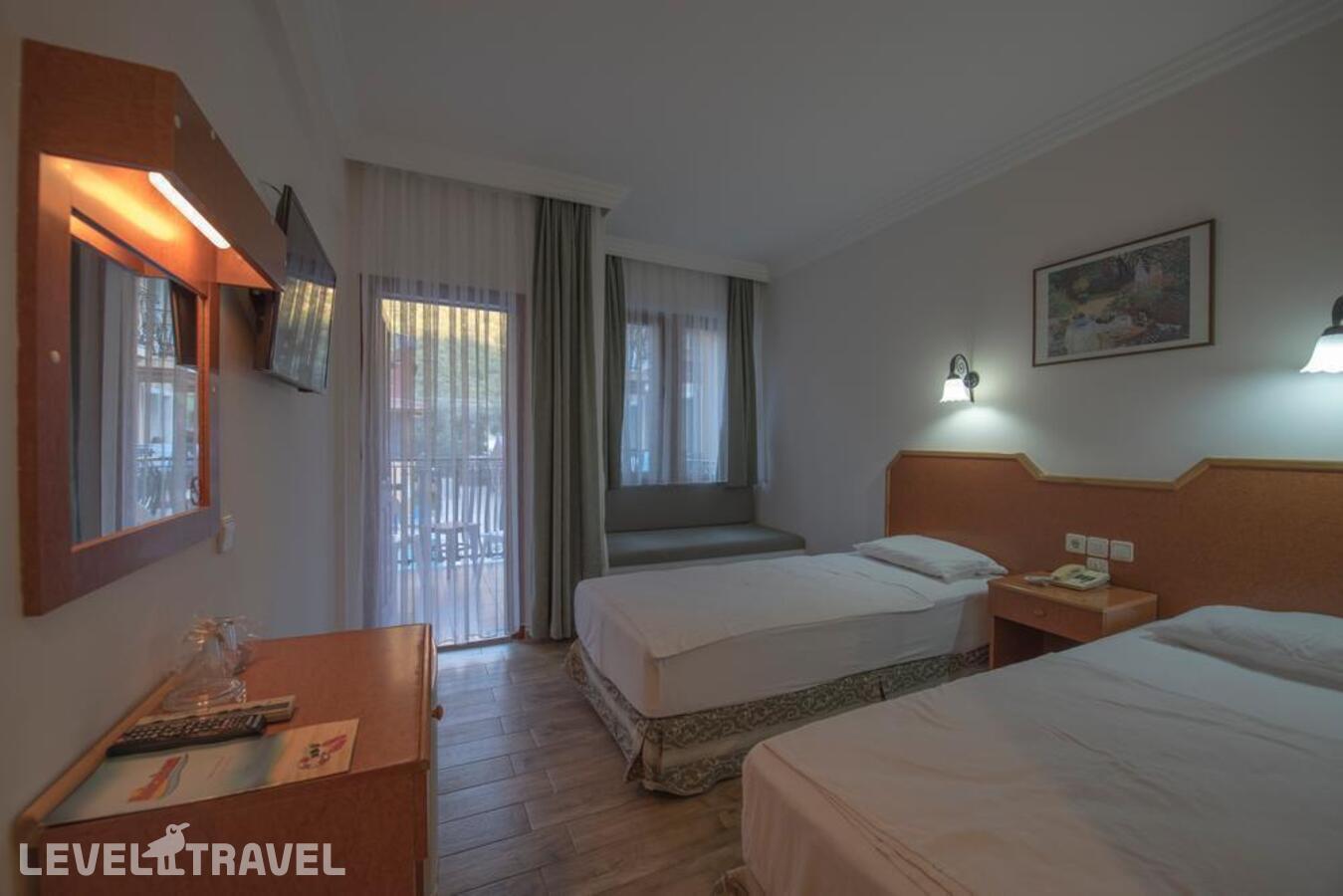 фотографии номера Стандартный номер отеля Belcehan Beach Hotel в Турция(Олюдениз) - фото №4