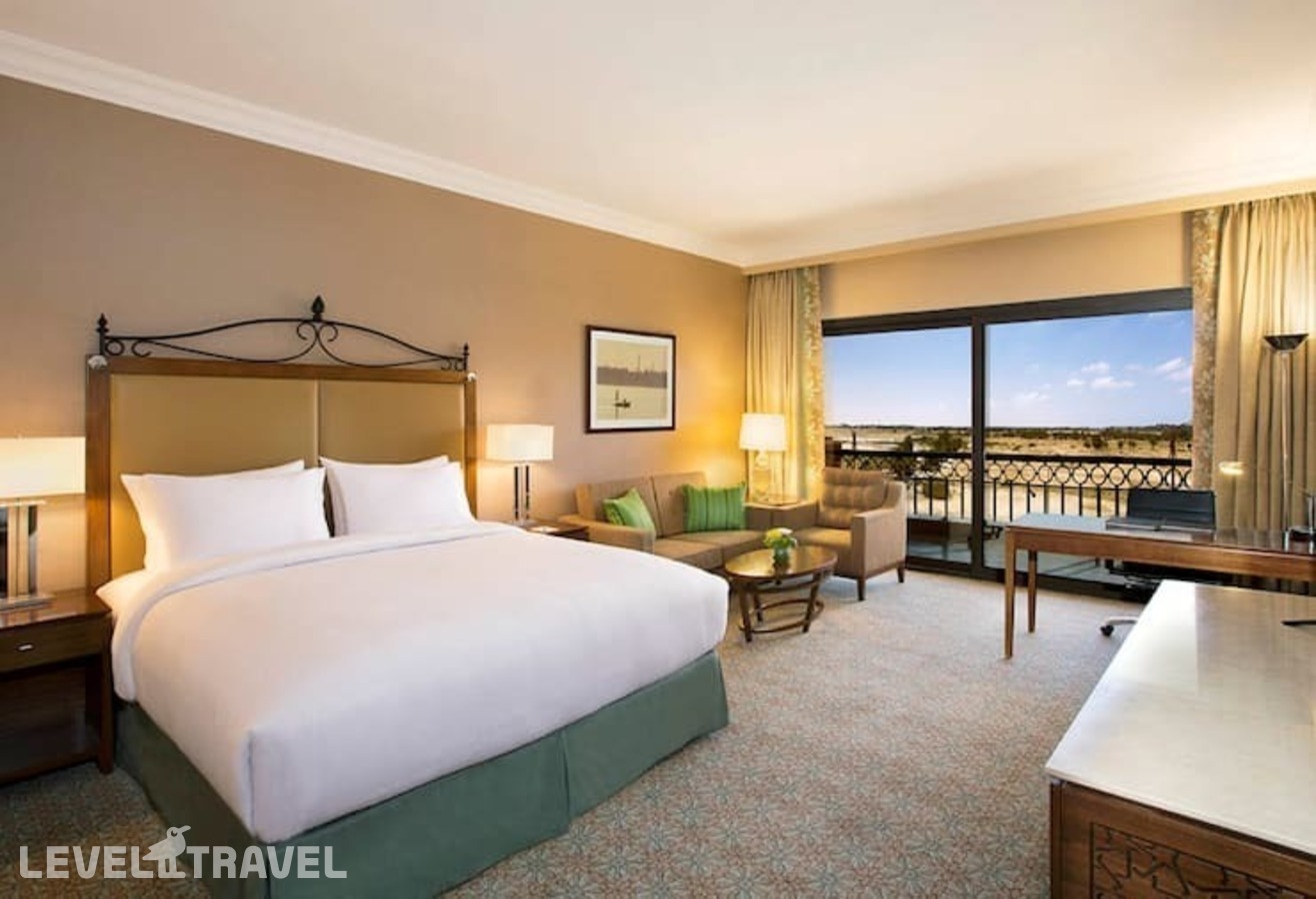 фотографии номера Представительский с видом на бассейн отеля Hilton Alexandria King's Ranch в Египет(Александрия) - фото №1