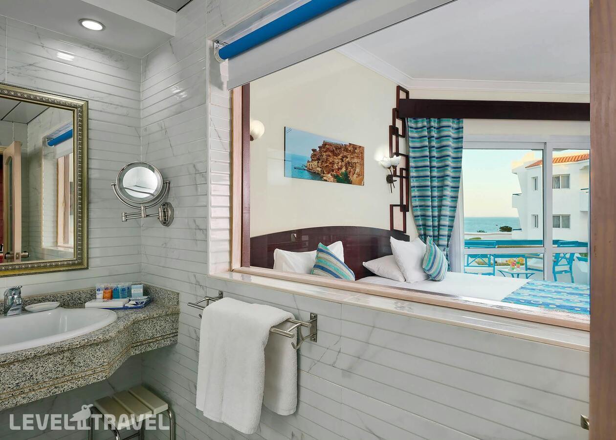 фотографии номера Улучшенный с фронтальным видом на море отеля Dreams Beach Resort в Египет(Тауэр Бэй) - фото №2