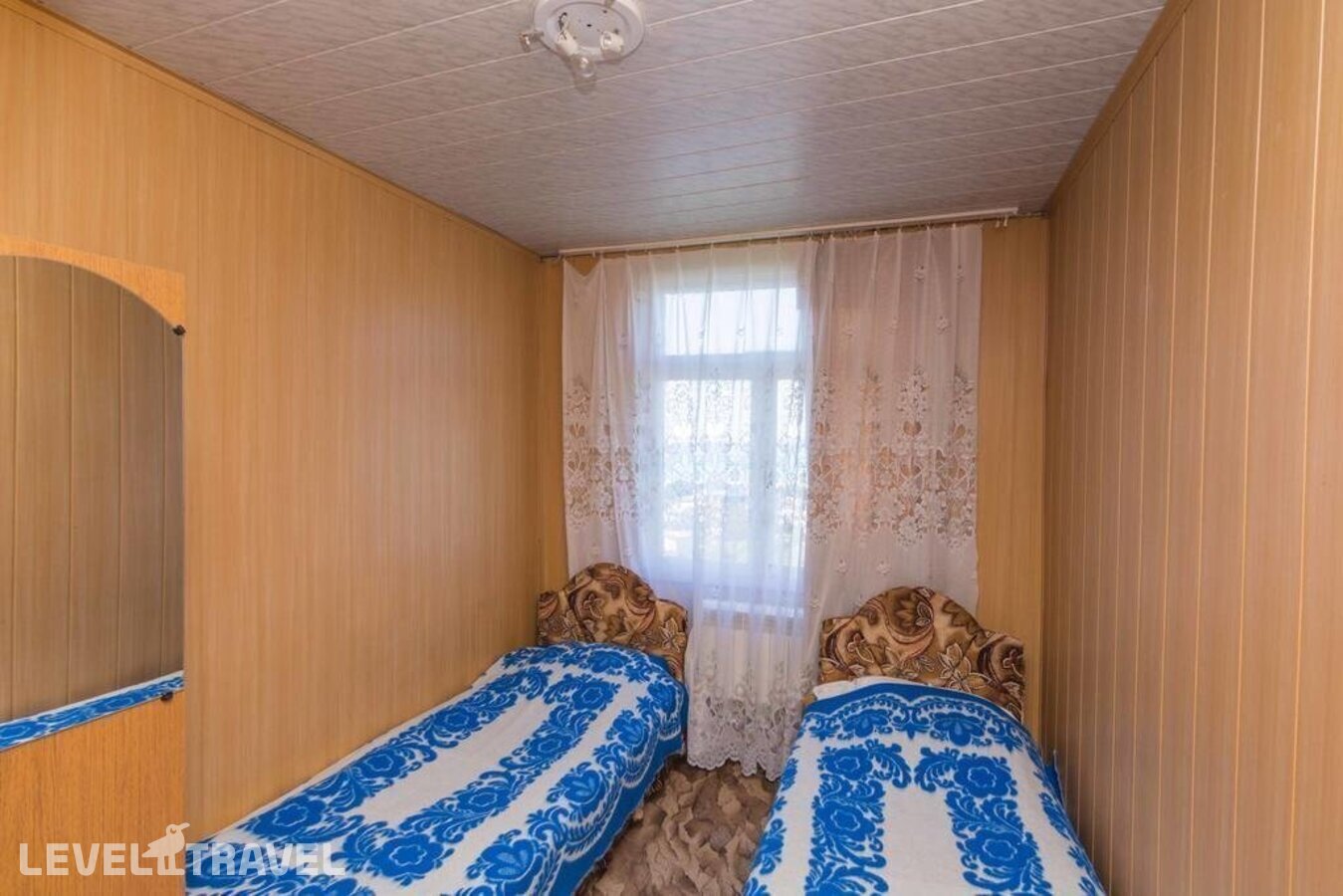 фотографии номера Экономичный (общая ванная комната) (две односпальные кровати) отеля Гостевой Дом Одиссей в Россия(Архипо-Осиповка) - фото №2