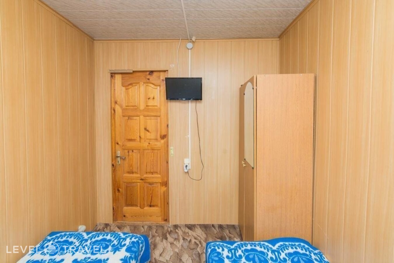 фотографии номера Экономичный (общая ванная комната) (две односпальные кровати) отеля Гостевой Дом Одиссей в Россия(Архипо-Осиповка) - фото №3