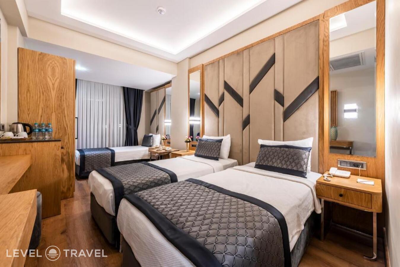 фотографии номера Трехместный номер отеля Endican Sultanahmet Hotel в Турция(Фатих) - фото №2
