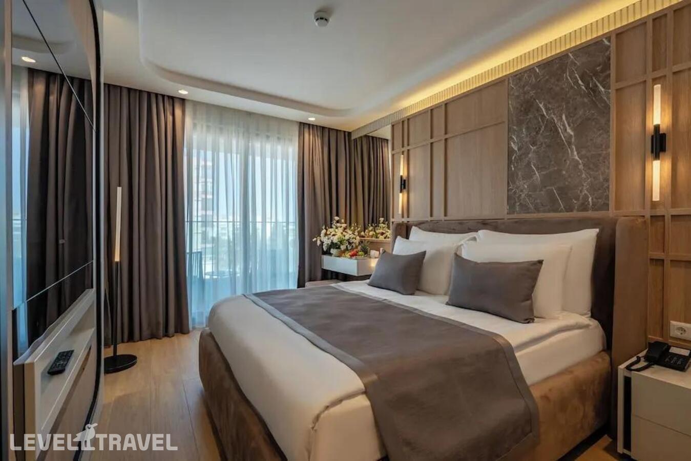 фотографии номера Экономичный номер отеля Awen Hotel в Турция(Лара) - фото №1