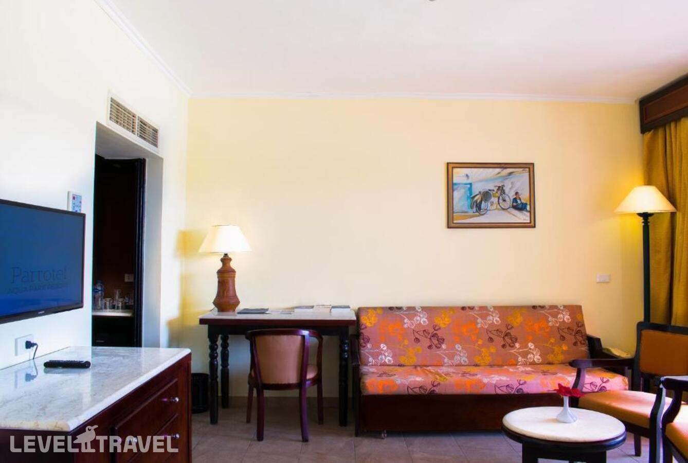 фотографии номера Семейный с видом на бассейн или сад отеля Parrotel Aqua Park Resort (Ex. Park Inn By Radisson Sharm) в Египет(Шарм-эль-Шейх) - фото №2