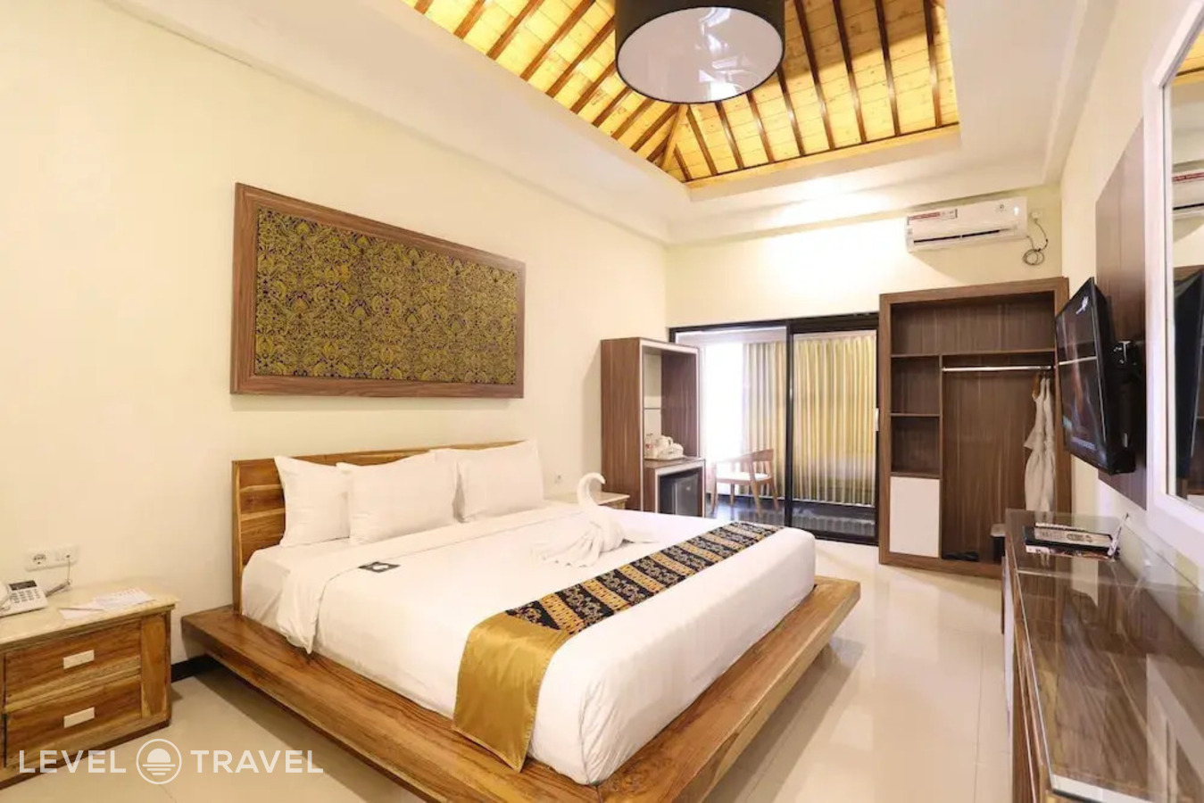 фотографии номера Люкс отеля Luminor Hotel Banyuwangi Yos Sudarso в Индонезия(Баньюванги) - фото №1