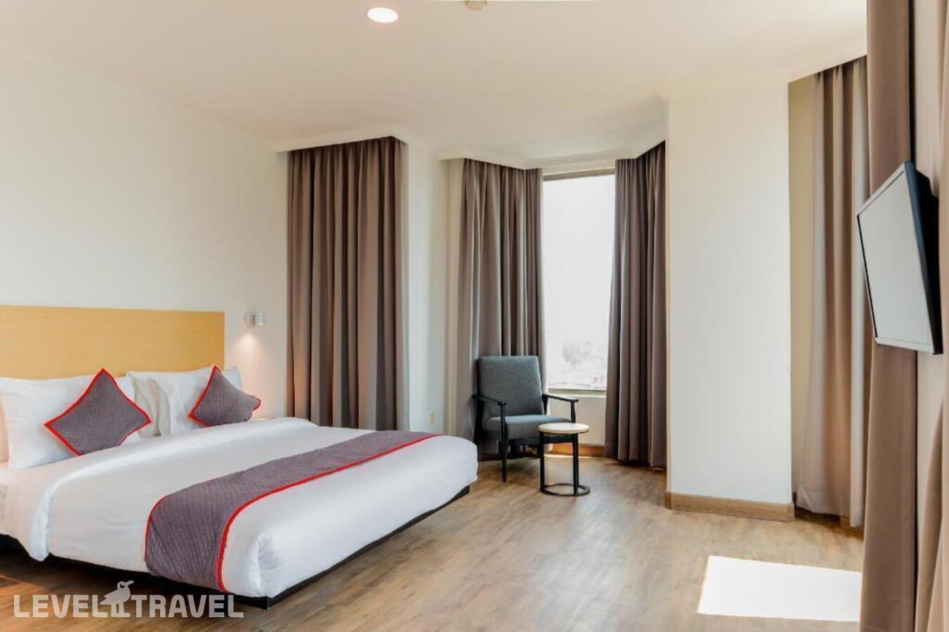фотографии номера Люкс отеля Oyo Townhouse 2 Hotel Gunung Sahari в Индонезия(Джакарта) - фото №1