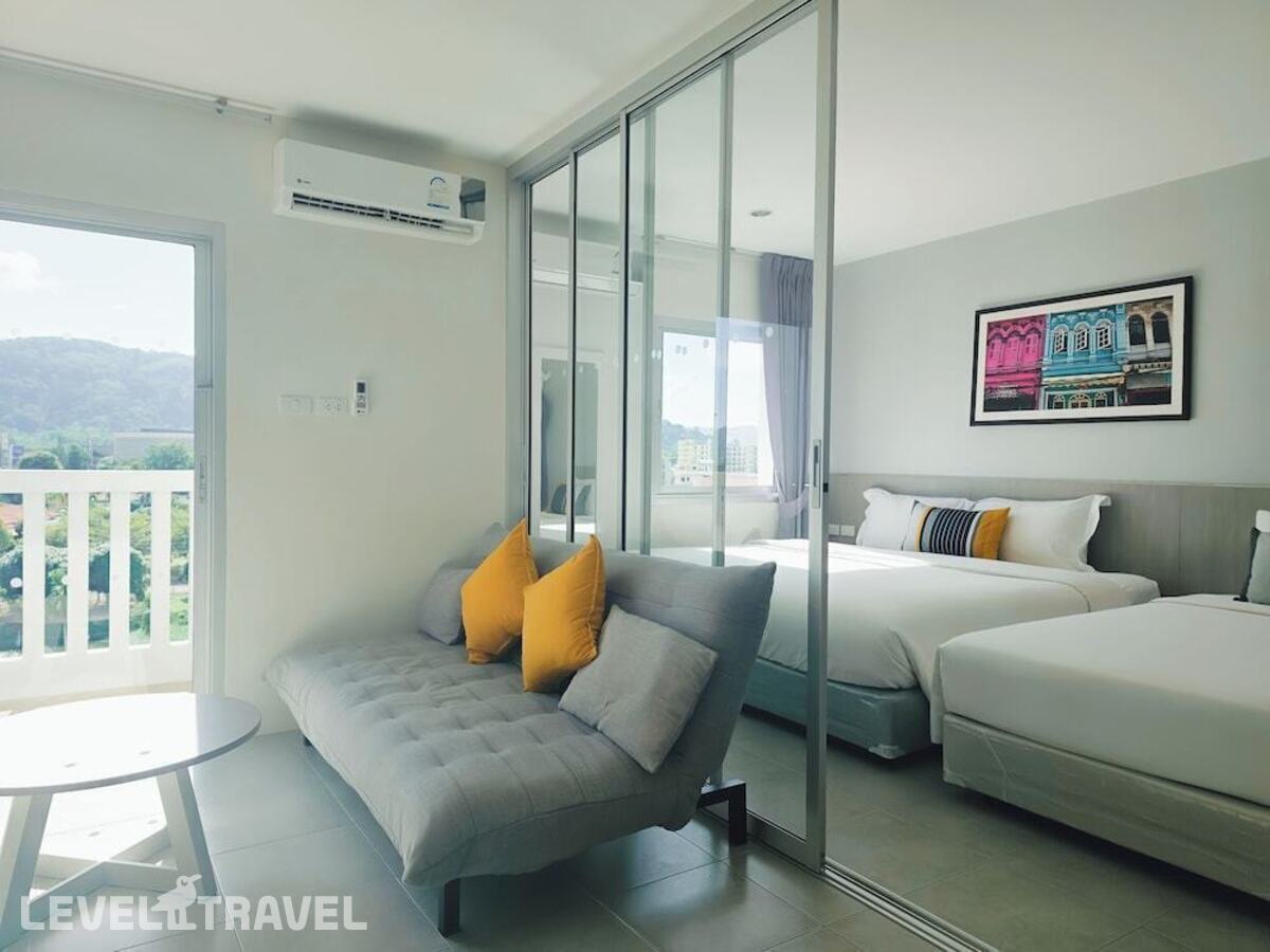 фотографии номера Стандартный номер отеля Recenta Suite Phuket Suanluang в Таиланд(город Пхукет) - фото №4