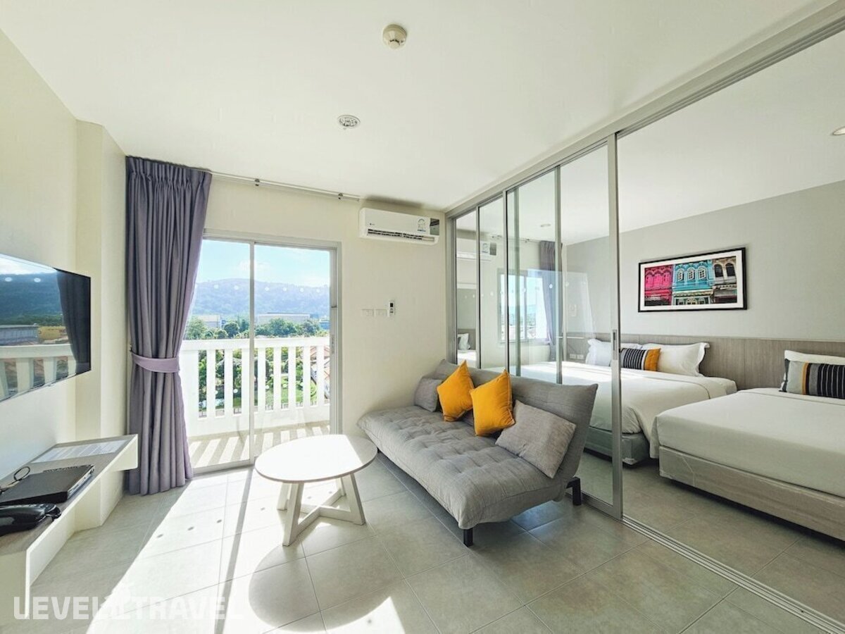 фотографии номера Семейный с видом на город отеля Recenta Suite Phuket Suanluang в Таиланд(город Пхукет) - фото №10