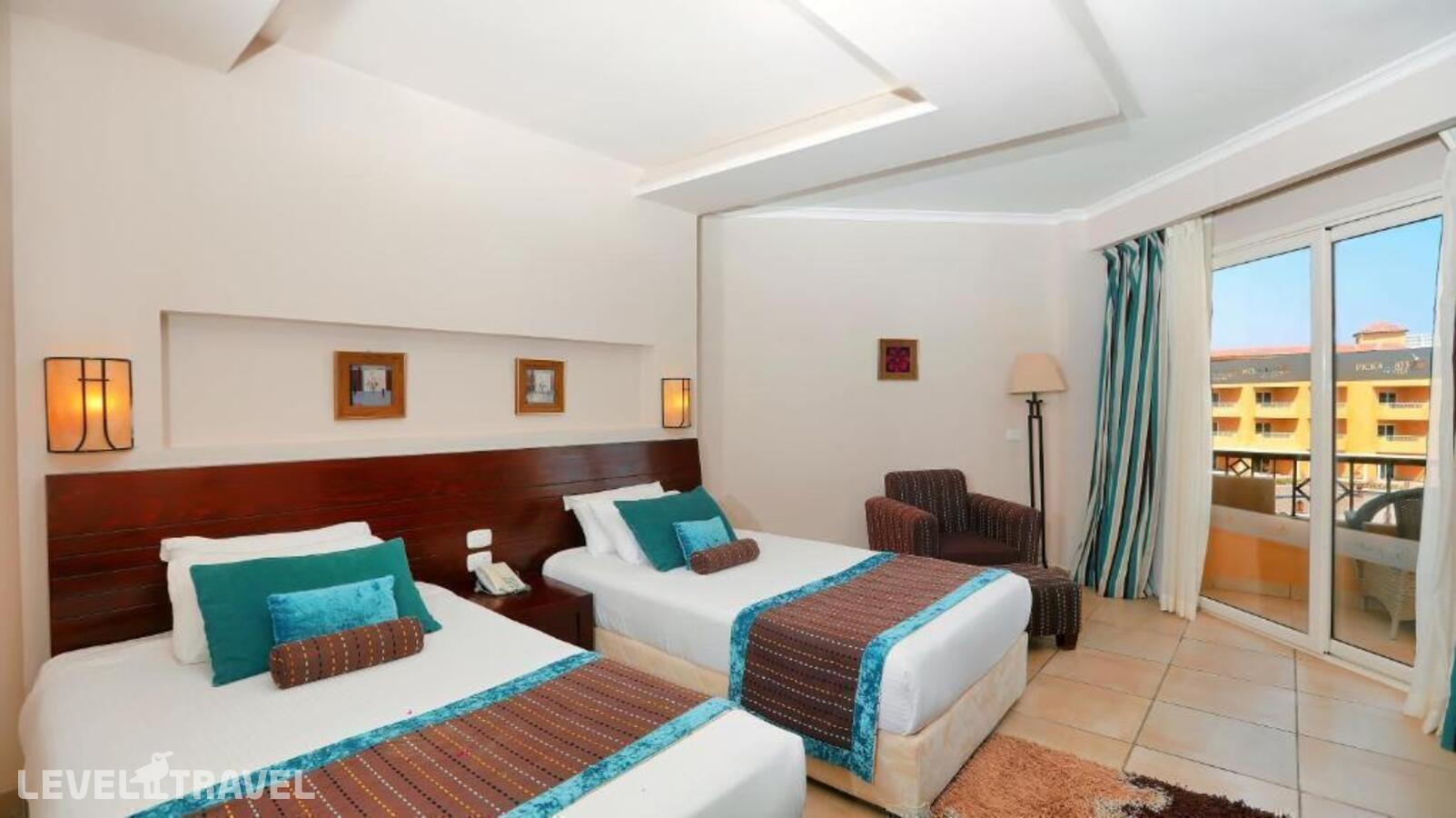 фотографии номера Семейный с видом на бассейн отеля Amwaj Beach Club Aqua Park & Spa в Египет(Сома Бей) - фото №1