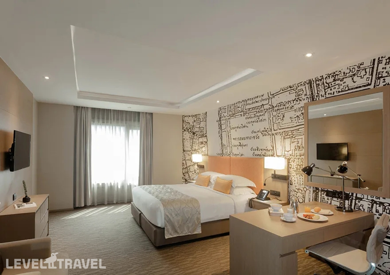 фотографии номера Двухместный люкс Skyline двуспальная кровать отеля Grand Mercure Bangkok Fortune в Таиланд(Бангкок) - фото №1
